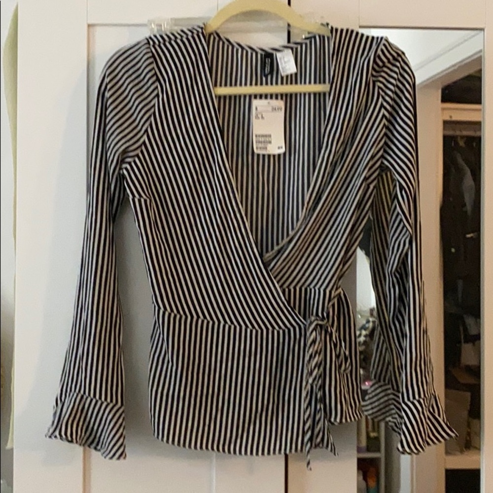 Black and white wrap blouse